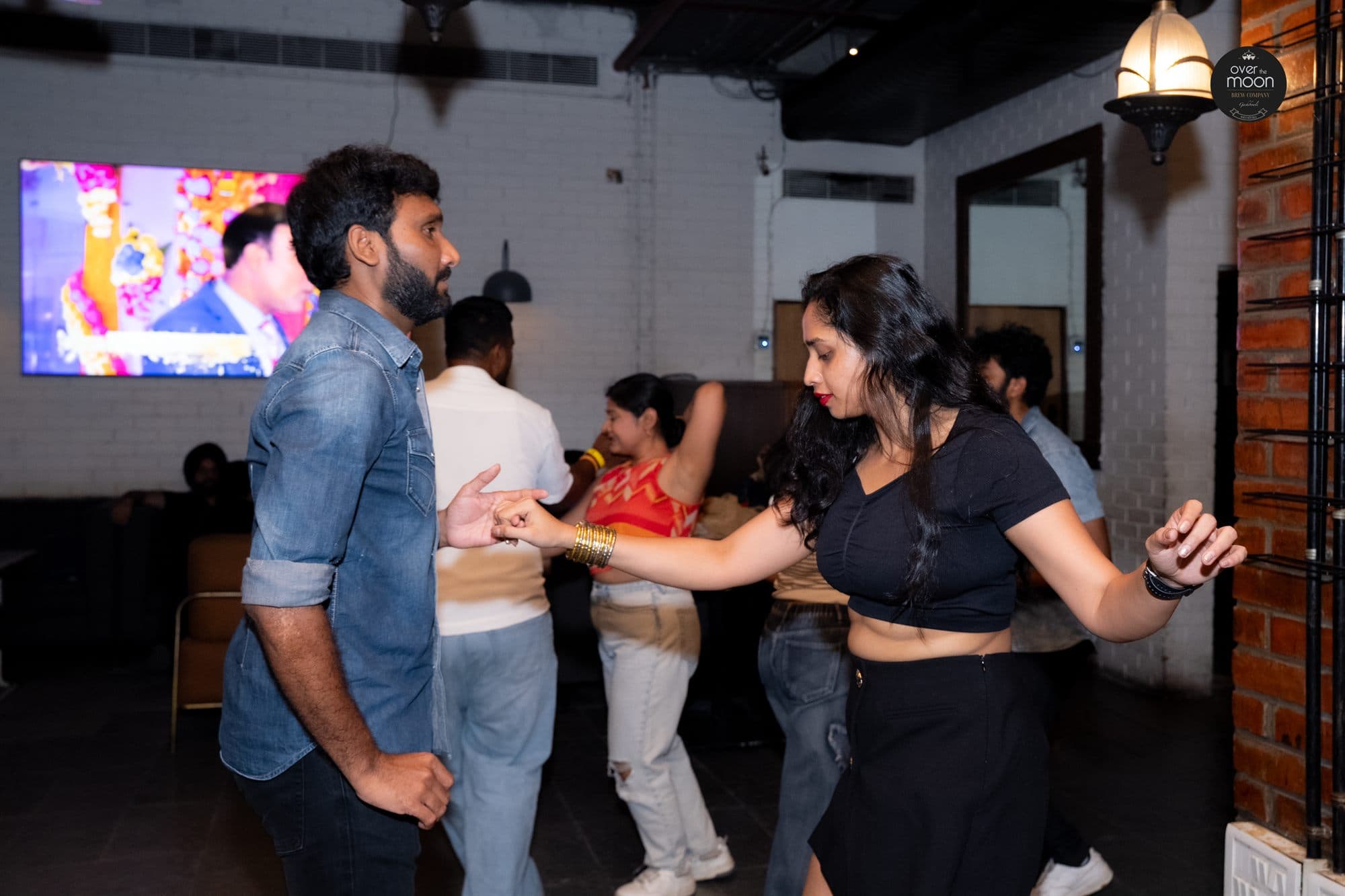 Mid-step rotation — partner dance in motion